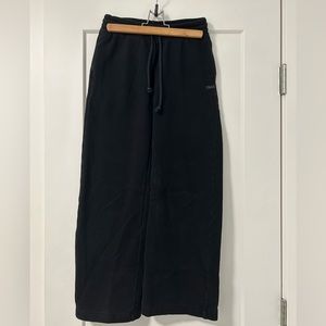 Aritzia TNA Cozy Fleece Boyfriend Basic Wide Sweatpants- Size XS in colour black